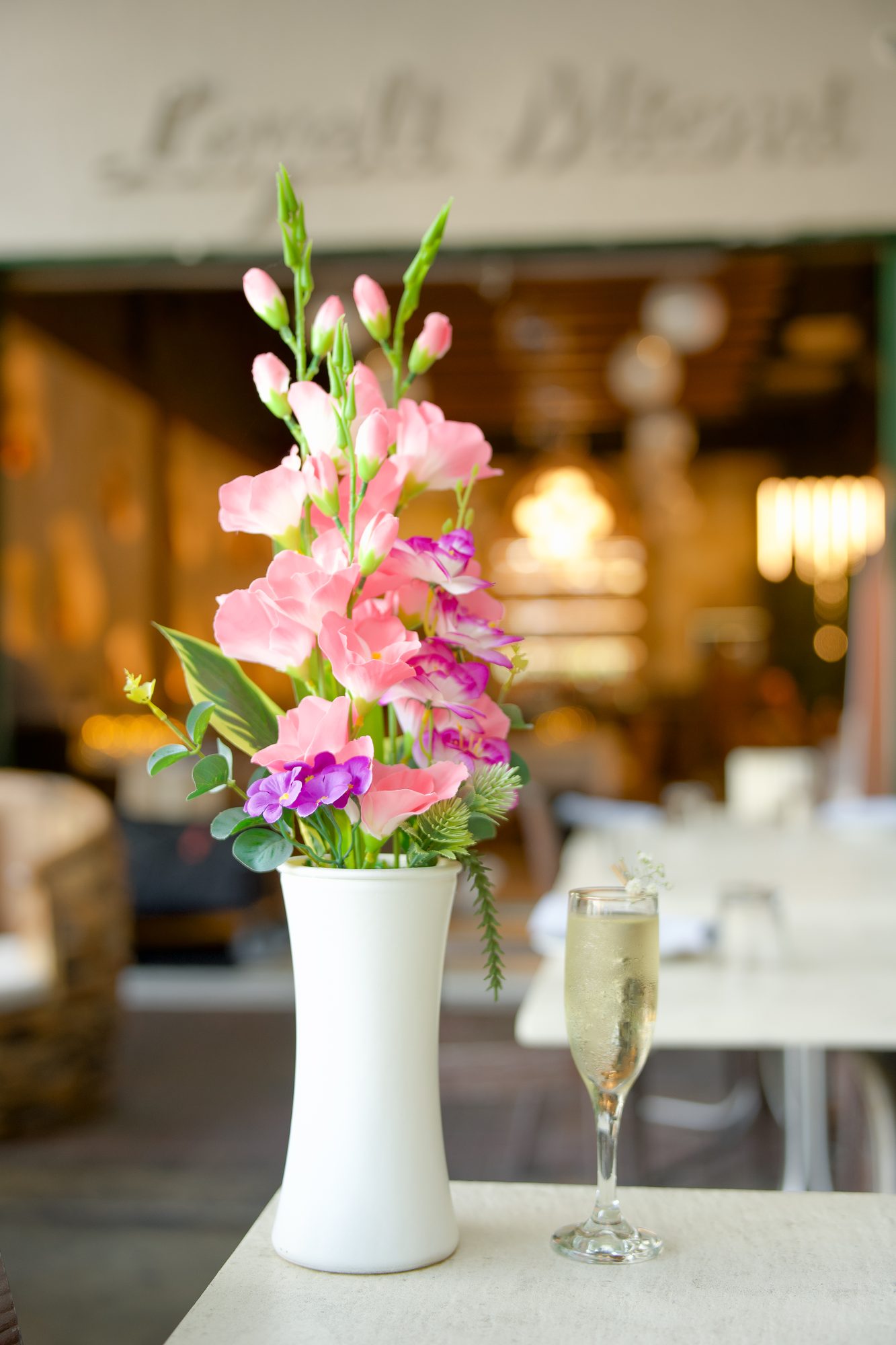 Flowers and champagne on a Layali celebration table